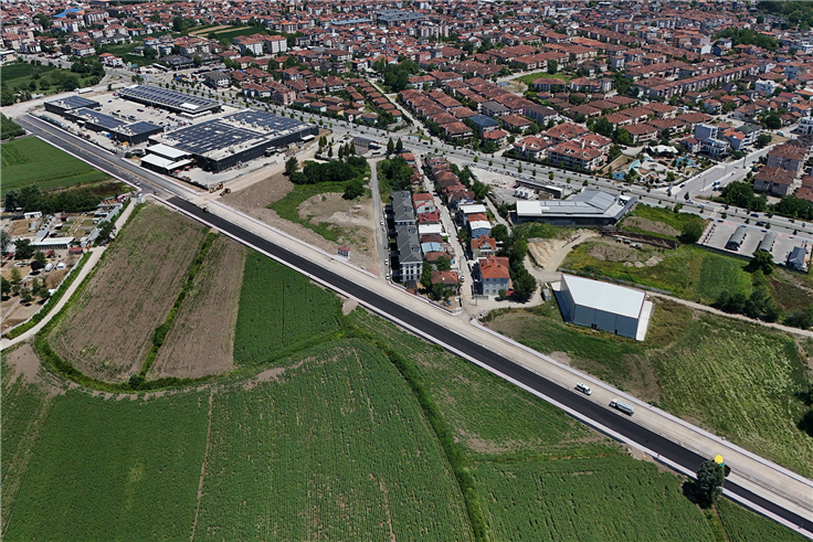 Büyükşehir Yazlık Kavşağı’nın trafik yükünü alacak duble yolda asfalt çalışmasına başladı
