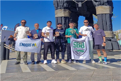 Büyükşehir sporcuları zorlu maratondan madalyayla döndü